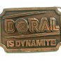 1970's - 1980's Doral Is Dynamite Belt Buckle By Hit Line USA 092914