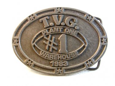 Vintage TVG Plant One Warehouse 1983 Belt Buckle