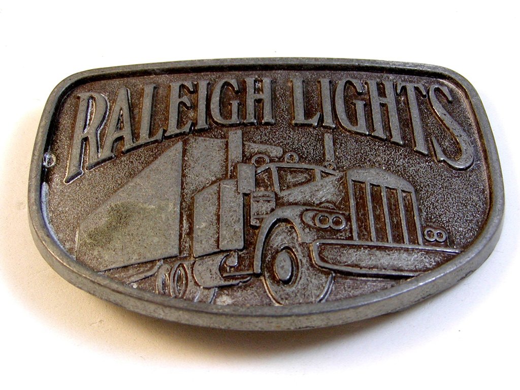 Vintage Nickle Raleigh Lights Truck Belt Buckle