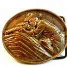 1968 Solid Brass Cowboy with Rifle Behind Boulder Belt Buckle