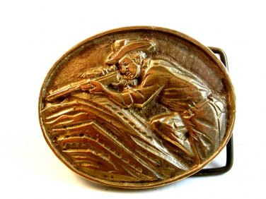 1968 Solid Brass Cowboy with Rifle Behind Boulder Belt Buckle