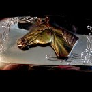 Horse belt buckle with floral decoration