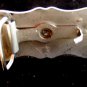 Bronco riding belt buckle with star design