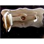 Bronco riding belt buckle with star design