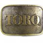 Vintage TORO Brass Belt Buckle By LEWIS BUCKLES 71916