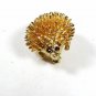 Goldtone Small Porcupine With Red Eyes Brooch by SARAH 91415