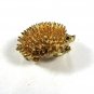 Goldtone Small Porcupine With Red Eyes Brooch by SARAH 91415