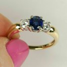 1.10Ct Round Cut D/VV1 Blue Sapphire 3-Stone Ring 14K Yellow Gold Over
