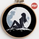 Silhouette of a girl and a bright moon on a black background - Cross-stitch pattern PDF