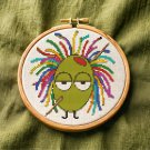 A green olive with bright hair – Cross stitch pattern