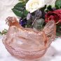 Hen on nest pink