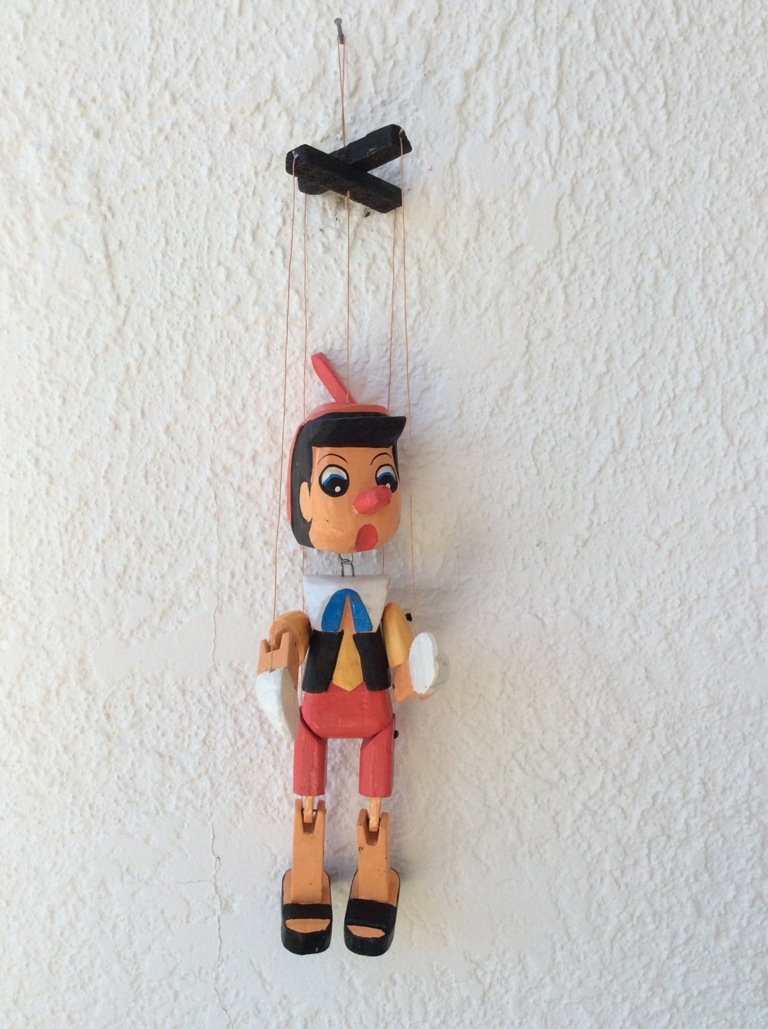 Wooden Pinocchio marionette puppet