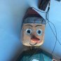 Wooden Pinocchio marionette puppet