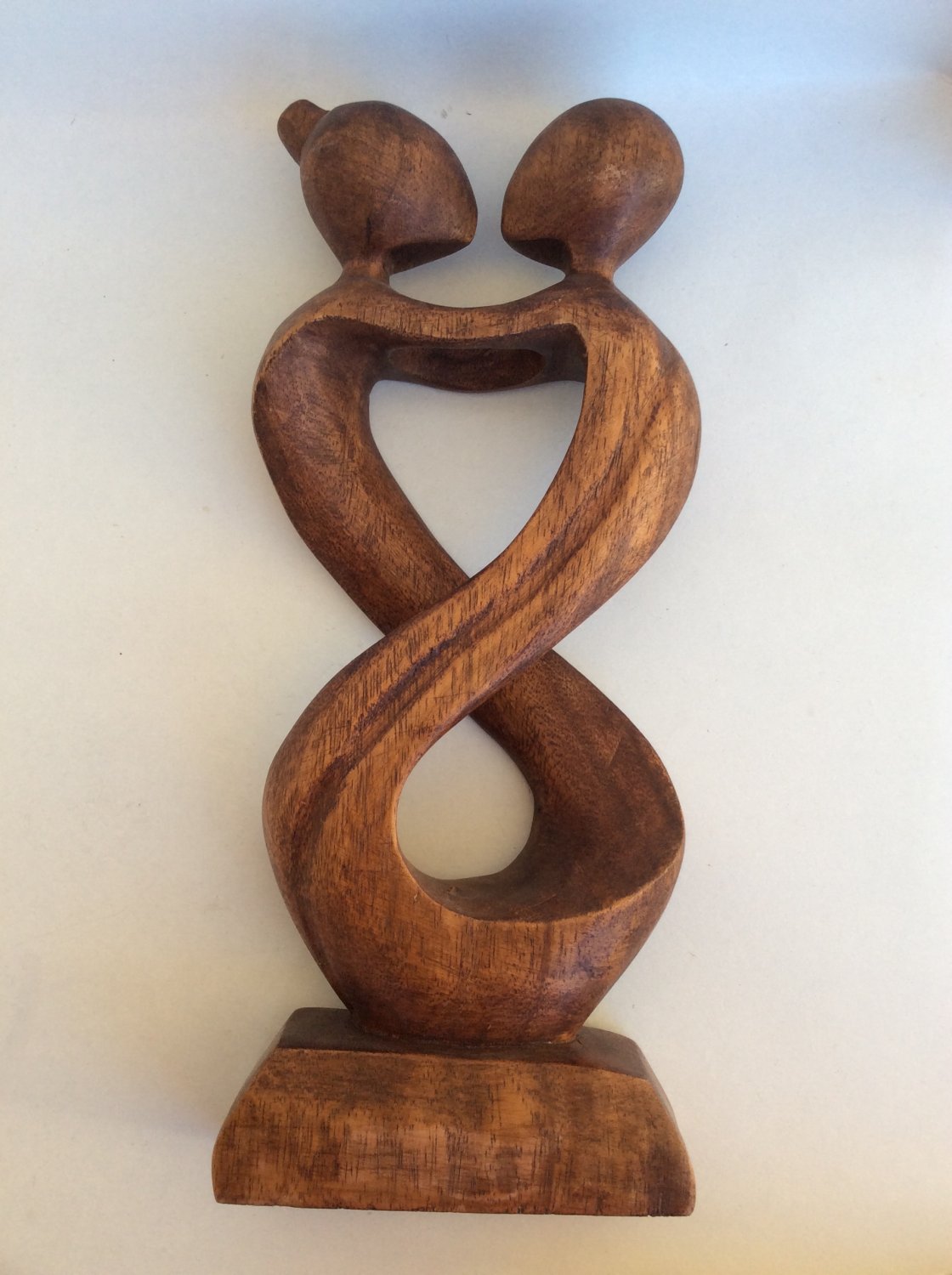 Wooden statue couple