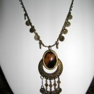Necklace with brown pendant