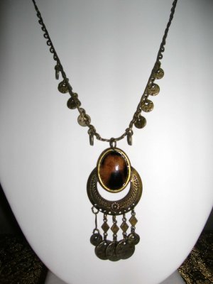 Necklace with brown pendant