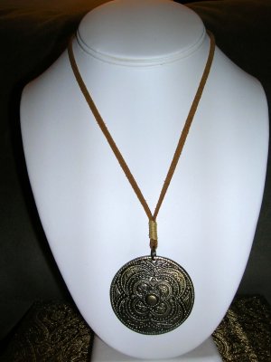 Leather necklace with medallion