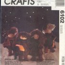 McCall Sewing Pattern 6102 Carolers, ll inches tall, traditional clothes.