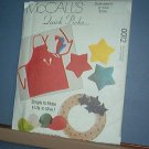 Sewing Pattern McCall's 0012 Apron hat, wreaths, star pillows, dog bed, tied log carrier