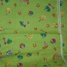 Sewing Fabric Cotton No 305 Sand toys on green