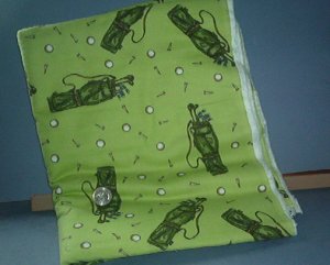 Sewing Fabric  No 362 - Light Green with golfing equipment