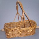 Basket - Rough weave, w/handle, 11X7X4" with 13" hi handle.  Darker than appears in picture