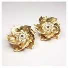 Golden Flowers Clip Earrings With Overlapping Petals And Corolla Of Rhinestones