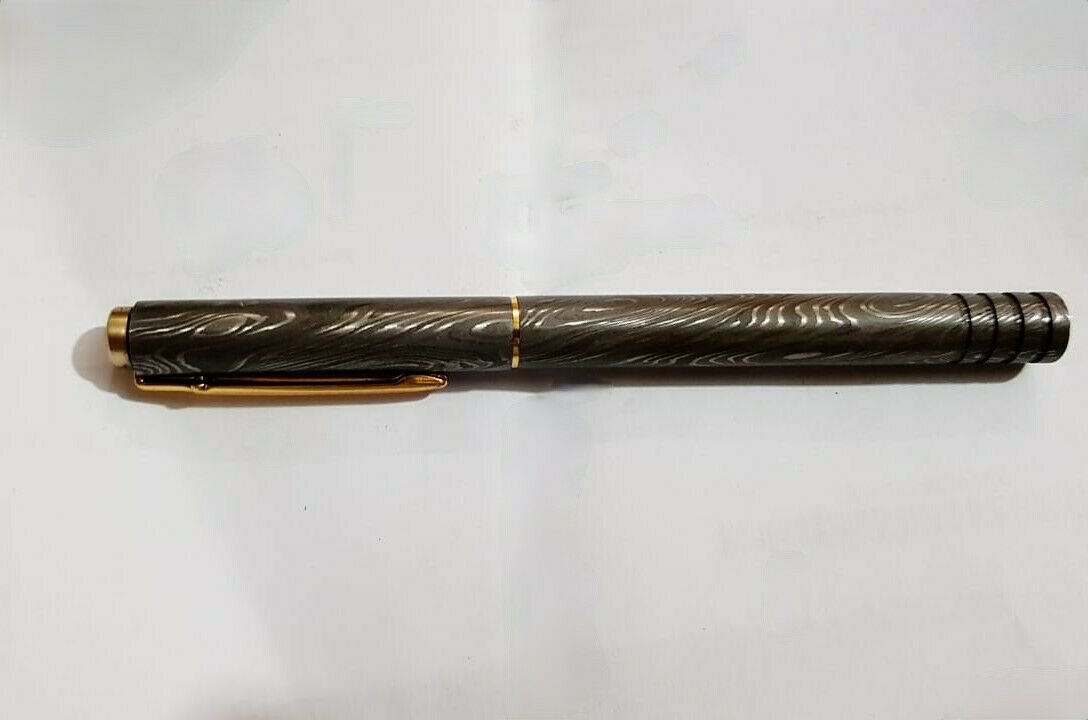 AN CUSTOM HANDMADE DAMASCUS STEEL AND BRASS WRITING PEN
