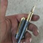 AN CUSTOM HANDMADE DAMASCUS STEEL AND BRASS WRITING PEN