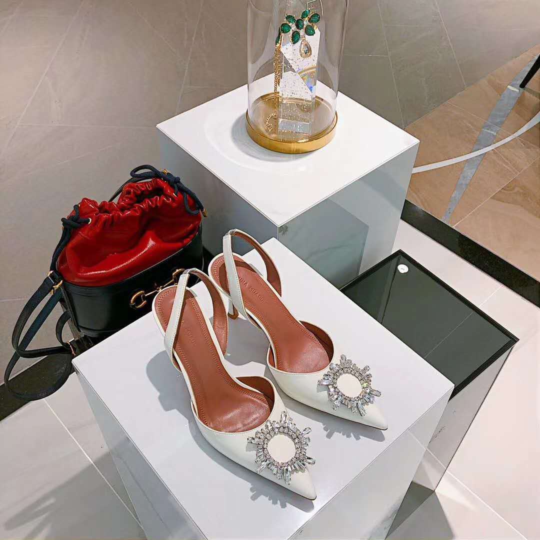 amina muaddi white pump