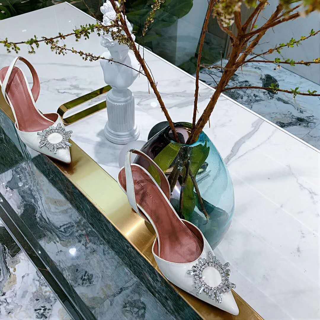amina muaddi white pump