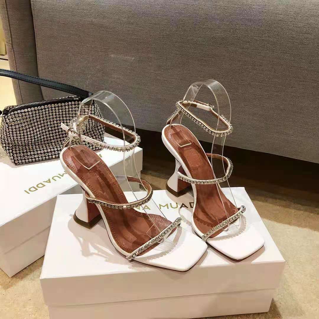 amina muaddi white pump