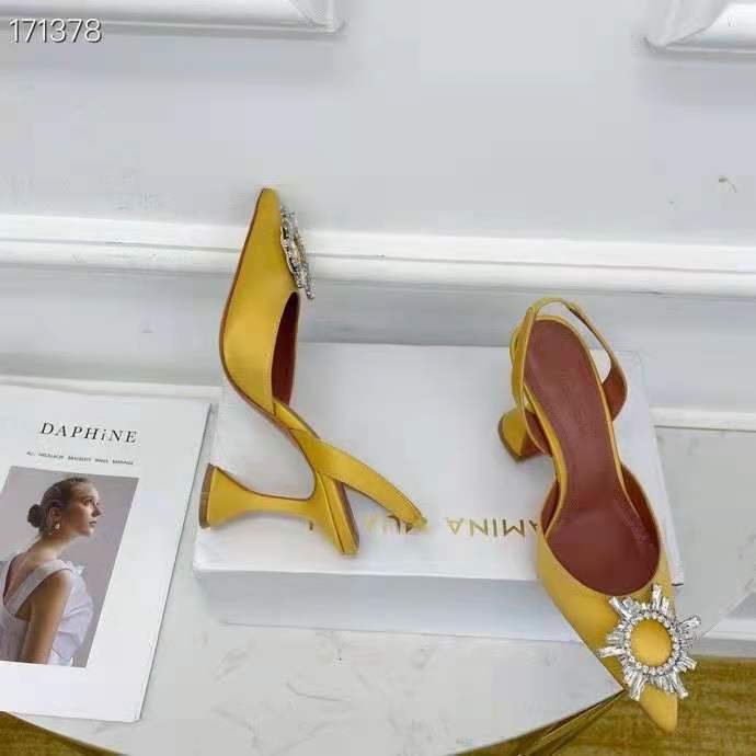 amina muaddi yellow begum