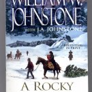 A ROCKY MOUNTAIN CHRISTMAS BY WILLIAM W. JOHNSTONE 2012 PAPERBACK BOOK 1ST ED. MINT