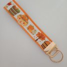 Autumn harvest scarecrow key fob wristlet