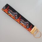 Black and orange motorcycle print key fob wristlet