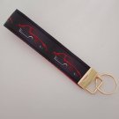 Black and red sports car key fob wristlet Black and red sports car key fob wristlet