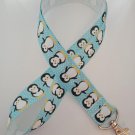 Blue and white penguin print lanyard / ID holder / badge holder
