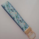 Blue butterfly print key fob wristlet