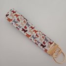 Brown and grey dog breed key fob wristlet Brown and grey dog breed key fob wristlet