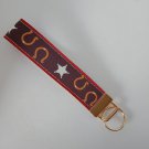 Brown horse shoe and star key fob wristlet Brown horse shoe and star key fob wristlet