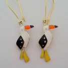 Gold enamel toucan charm earrings