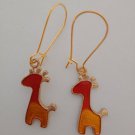 Gold and orange giraffe charm earrings