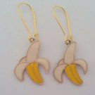 Gold banana charm earrings