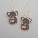 Gold enamel koala charm earrings