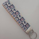 Pastel pink and blue heart and flower key fob wristlet Pastel pink and blue heart and flower key fob wristlet