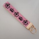 Pink and black crown print key fob wristlet