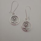 Silver flower earrings in circles