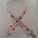 Pink and green penguin Christmas lanyard / ID holder / badge holder
