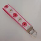 Pink and white flower key fob wristlet